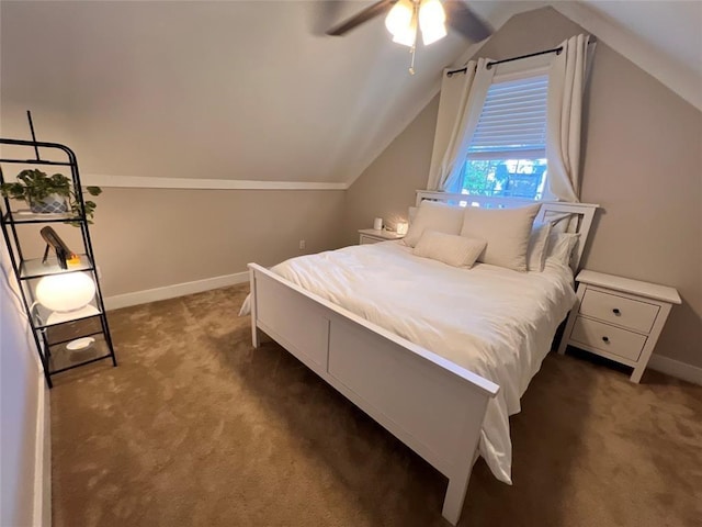 bedroom featuring dark colored carpet, ceiling fan, lofted ceiling, and baseboards