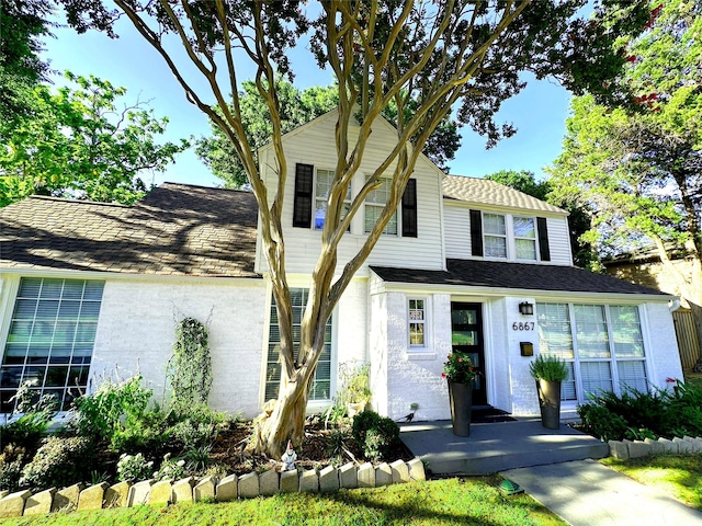 6867 Gaston Ave, Dallas, TX 75214 - view of front of house featuring a shingled roof