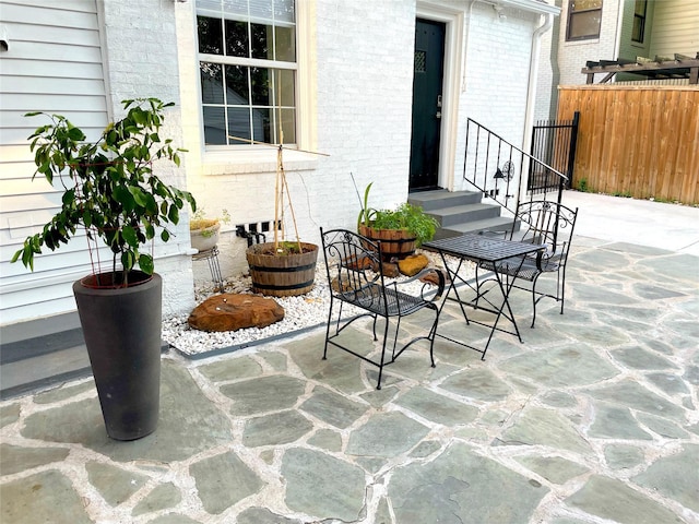 view of patio with fence