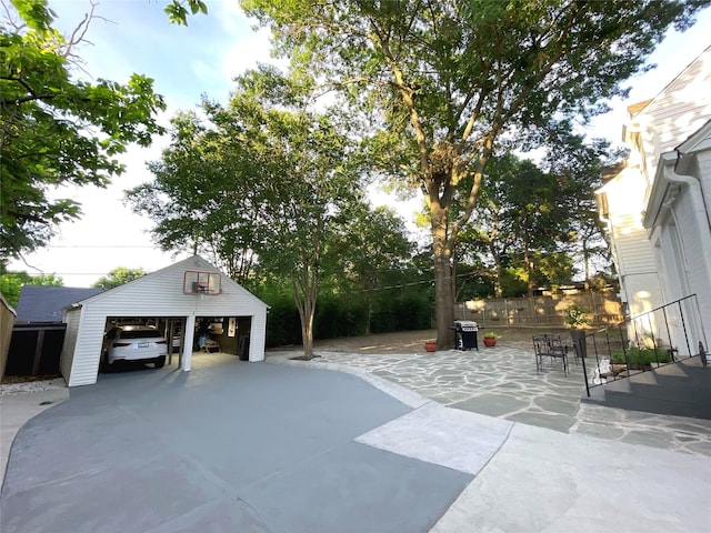 exterior space with an outbuilding and fence