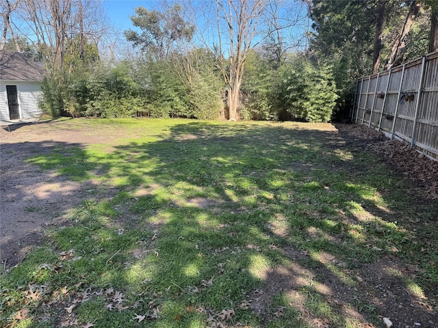 view of yard featuring fence