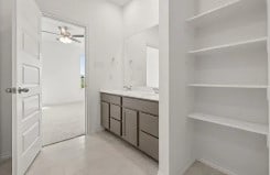 bathroom featuring tile patterned floors and vanity