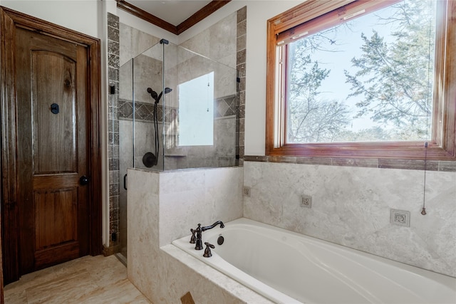 bathroom featuring separate shower and tub