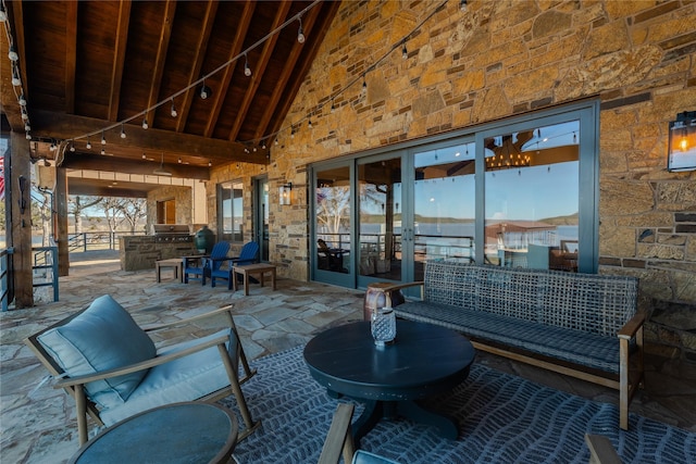 view of patio / terrace with an outdoor living space and an outdoor kitchen