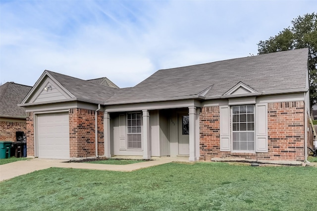 single story home featuring a garage and a front lawn