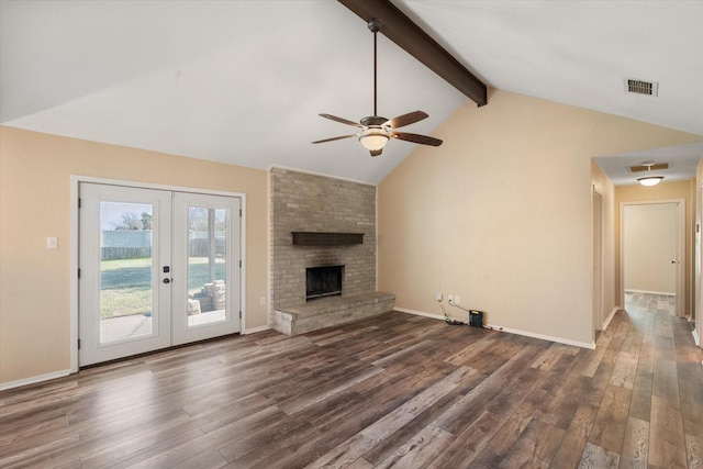 unfurnished living room featuring french doors, vaulted ceiling with beams, dark hardwood / wood-style flooring, ceiling fan, and a fireplace