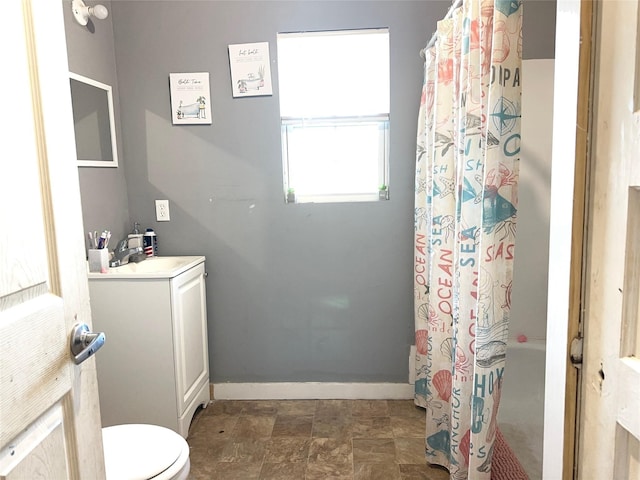 bathroom with sink and toilet