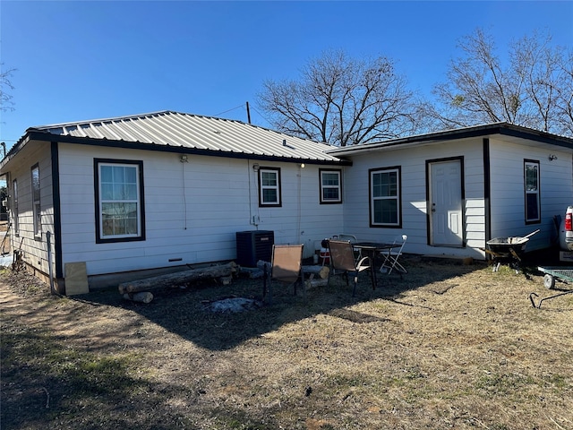 back of house with cooling unit