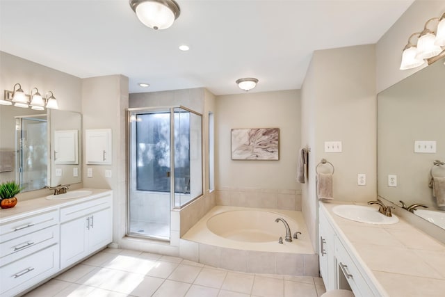 bathroom with vanity, tile patterned floors, and independent shower and bath