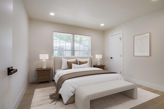 bedroom with light hardwood / wood-style flooring