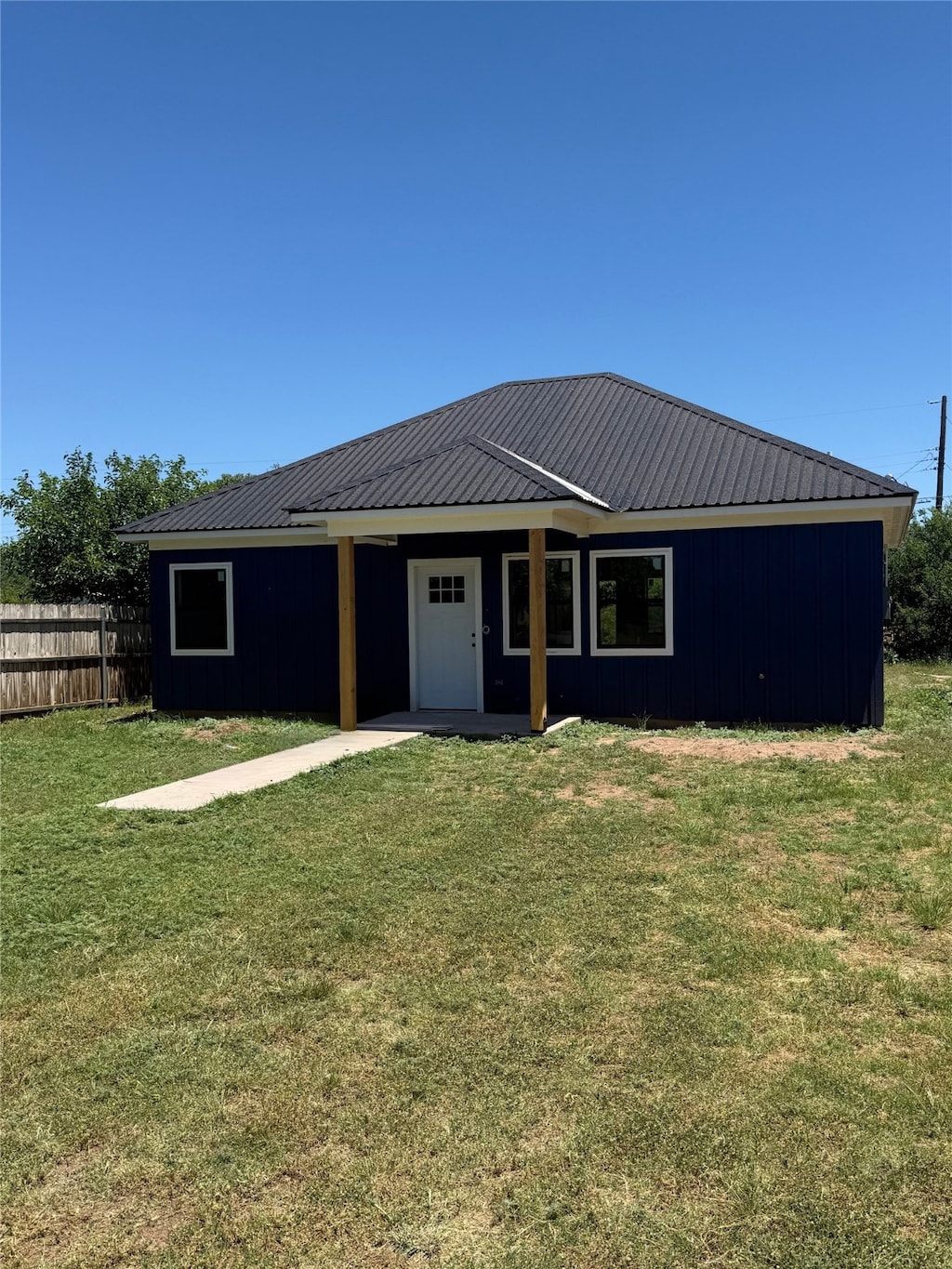 TBD S Cherry St, Merkel, TX 79536 - rear view of property featuring board and batten siding and metal roof