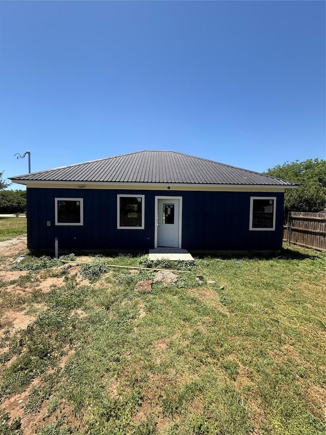 TBD S Cherry St, Merkel, TX 79536 - rear view of property with board and batten siding and metal roof