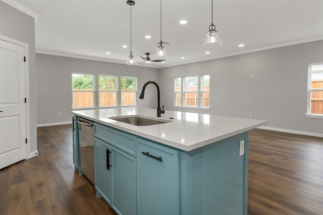 kitchen featuring pendant lighting, sink, crown molding, dishwasher, and a kitchen island with sink