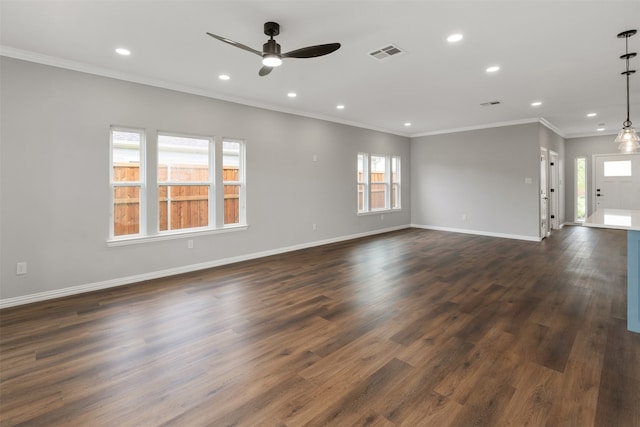 unfurnished living room with ornamental molding, ceiling fan, and dark hardwood / wood-style flooring