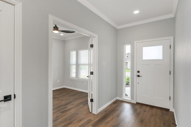 entryway featuring crown molding, ceiling fan, and dark hardwood / wood-style floors