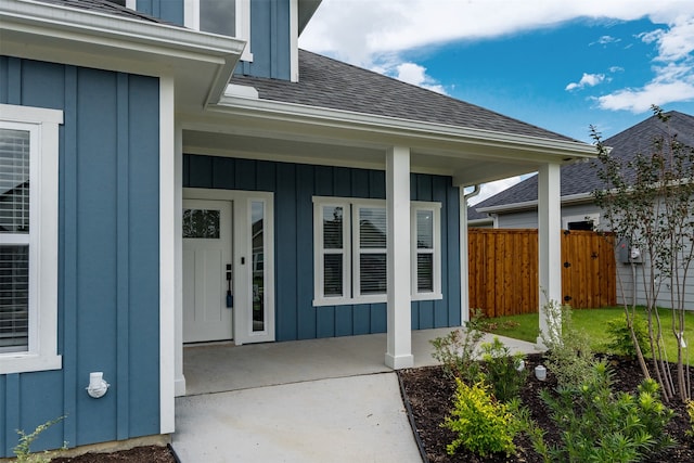 entryway featuring crown molding and dark hardwood / wood-style flooring