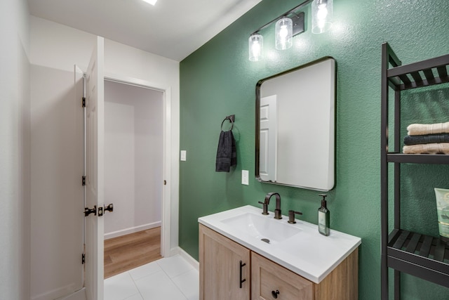 bathroom featuring vanity and tile patterned flooring