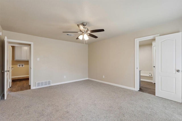 unfurnished bedroom with carpet floors and ceiling fan