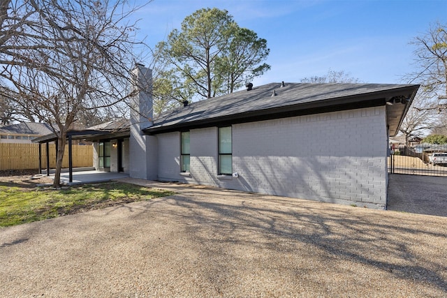 rear view of house featuring a patio