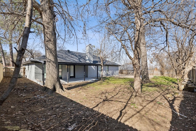 rear view of property with a patio