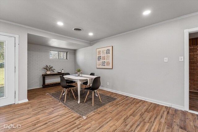 empty room with ornamental molding and dark hardwood / wood-style floors