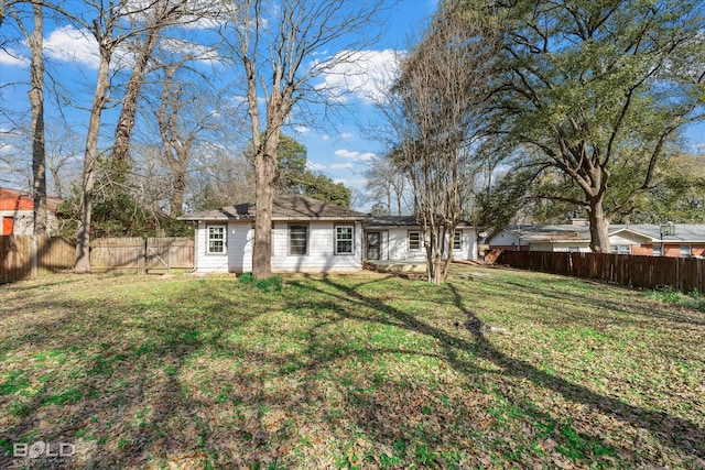 exterior space with a fenced backyard