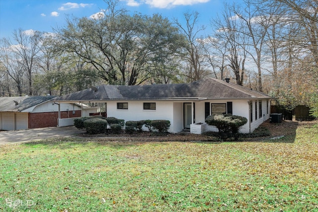 single story home featuring concrete driveway, brick siding, and a front lawn