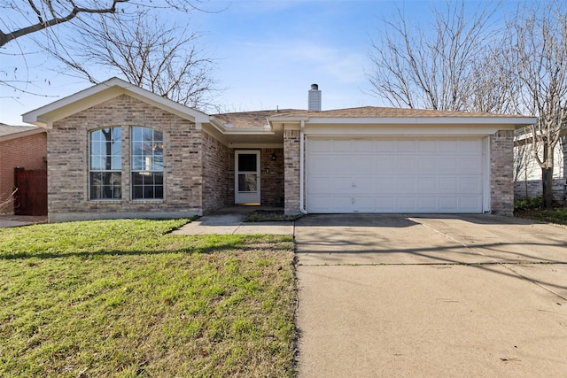 single story home with a garage and a front lawn