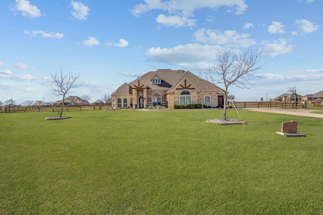 view of front facade with a front yard