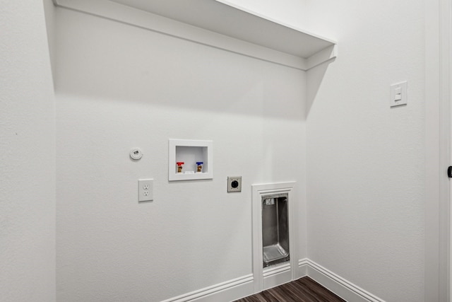 clothes washing area featuring hardwood / wood-style floors, electric dryer hookup, washer hookup, and hookup for a gas dryer