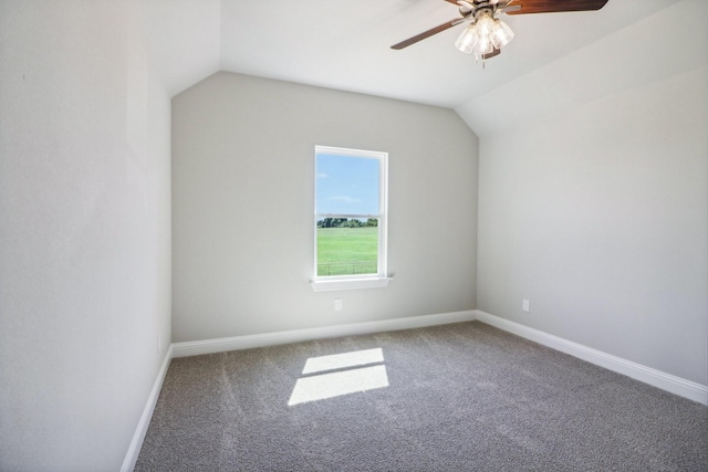 additional living space with lofted ceiling, ceiling fan, and carpet