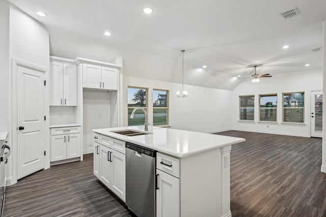 kitchen featuring dishwasher, sink, white cabinets, and an island with sink