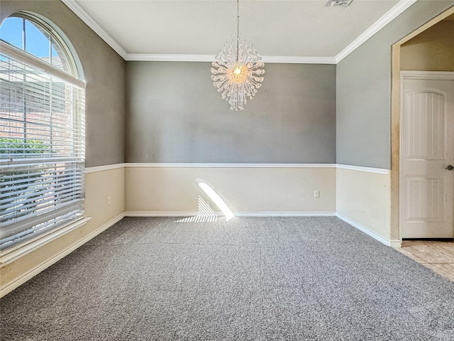 empty room with crown molding, light carpet, and a notable chandelier