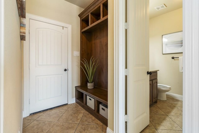 mudroom featuring light tile patterned floors