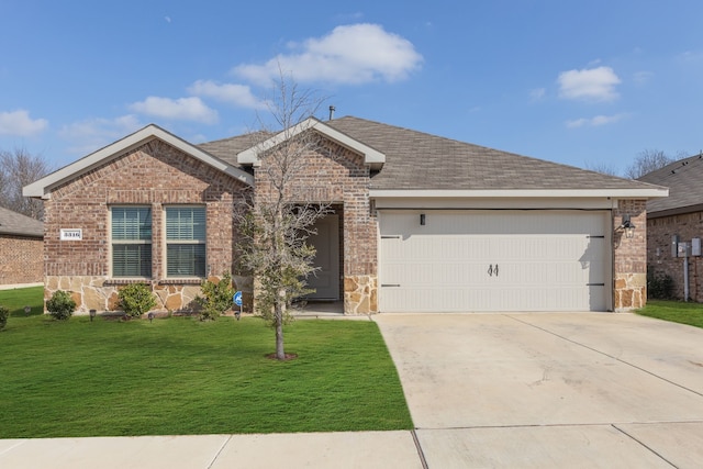 ranch-style house with roof with shingles, concrete driveway, an attached garage, a front yard, and brick siding