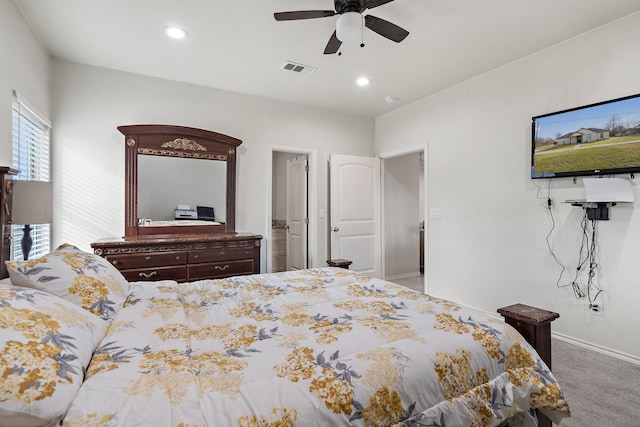 bedroom with ceiling fan and carpet