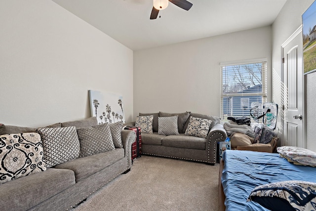 living room featuring light carpet and ceiling fan