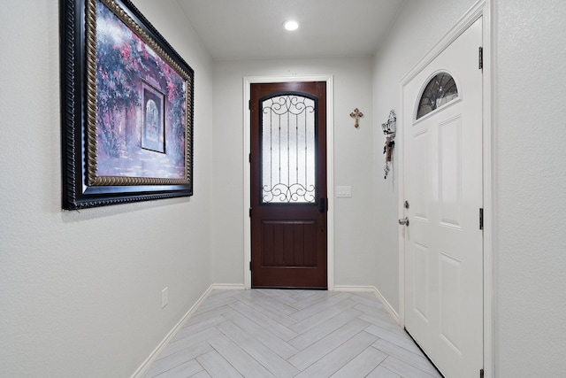 entrance foyer with light parquet flooring