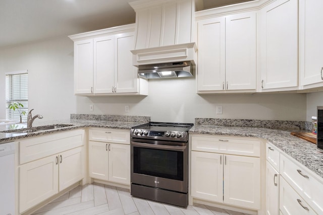 kitchen featuring white cabinets, light stone countertops, sink, and stainless steel range with electric cooktop