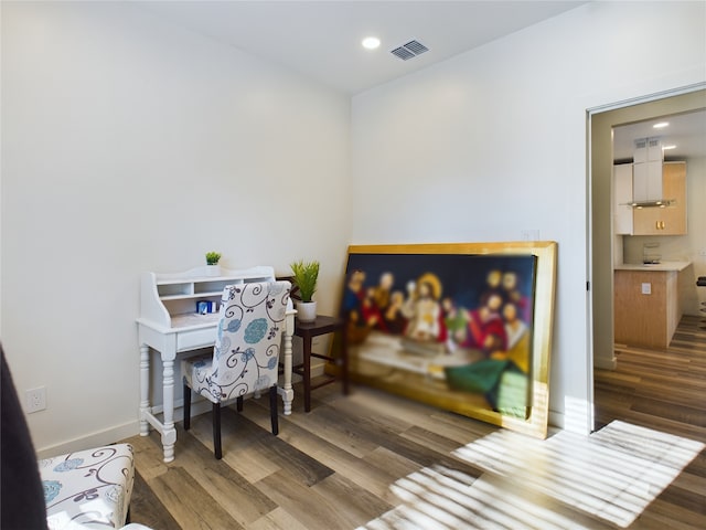 home office featuring recessed lighting, visible vents, baseboards, and wood finished floors