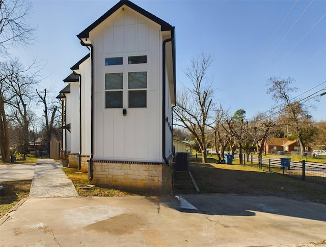 view of outdoor structure featuring fence