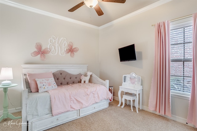 bedroom with multiple windows, carpet floors, ornamental molding, and ceiling fan