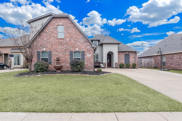 view of front of home with a front lawn