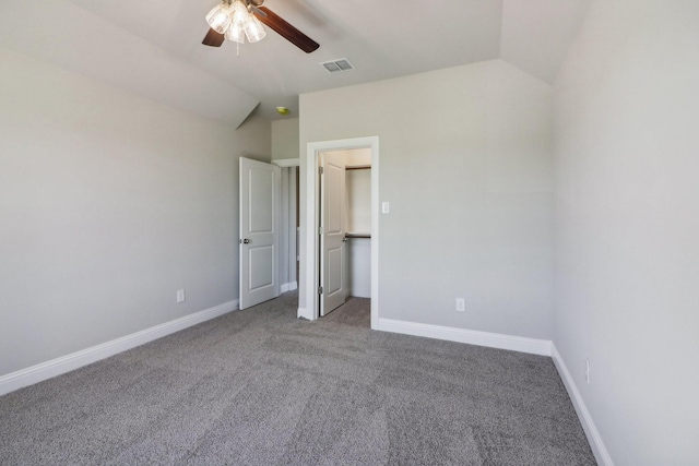 bonus room with vaulted ceiling, ceiling fan, and carpet flooring