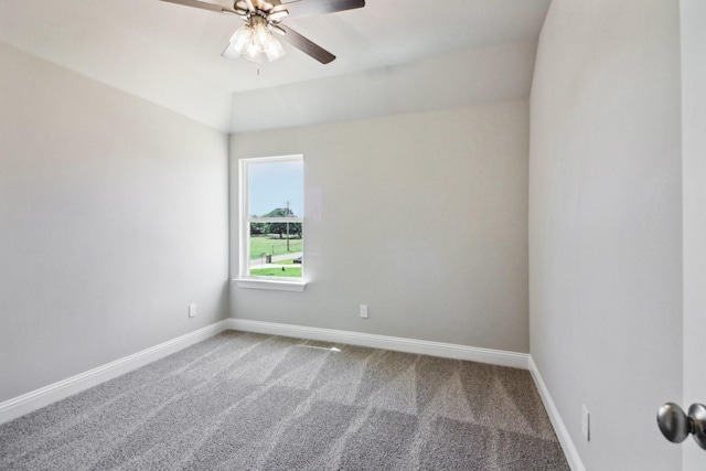 unfurnished bedroom with vaulted ceiling, light colored carpet, a closet, and ceiling fan