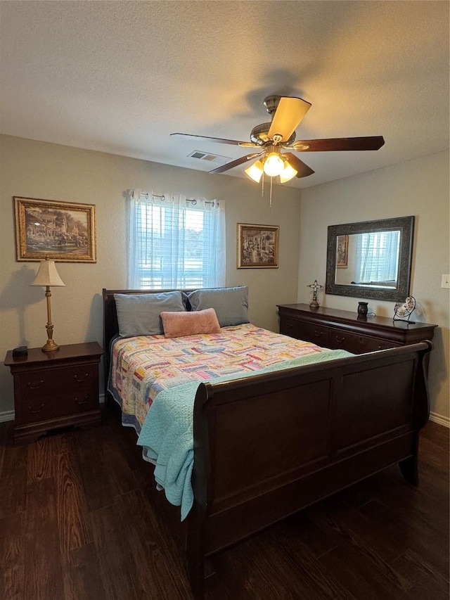 1006 High Point Dr, Mineral Wells, TX 76067 - bedroom with wood finished floors, baseboards, and a ceiling fan