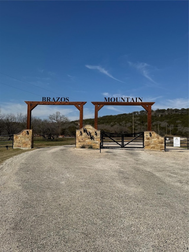 1006 High Point Dr, Mineral Wells, TX 76067 - view of street featuring a gate