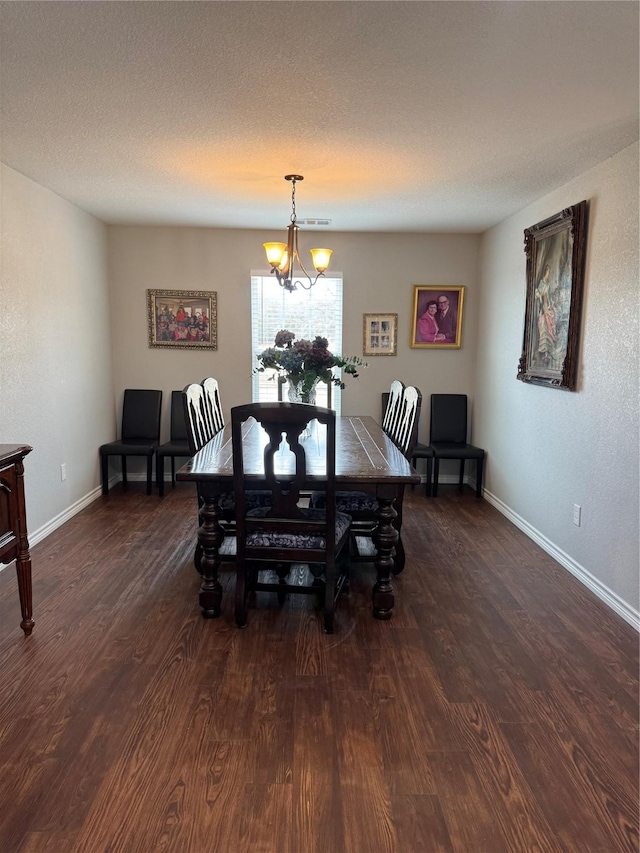 1006 High Point Dr, Mineral Wells, TX 76067 - dining space featuring a chandelier, wood finished floors, and baseboards