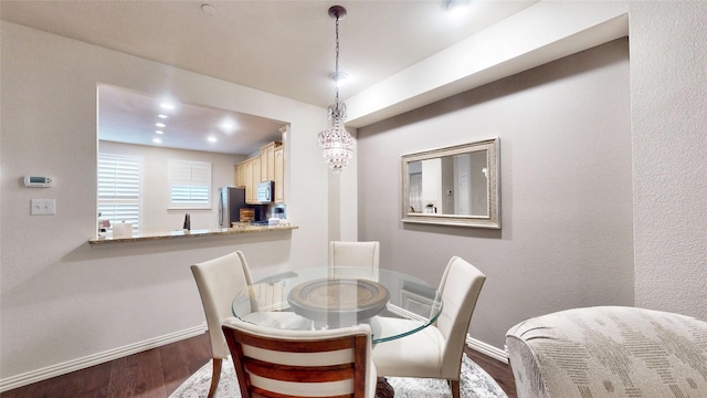 dining room featuring wood-type flooring