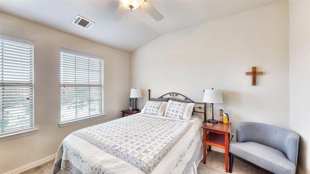 carpeted bedroom with lofted ceiling and ceiling fan